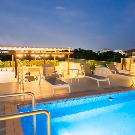 Hotel Stay Here Suites Santo Domingo Bagian luar foto