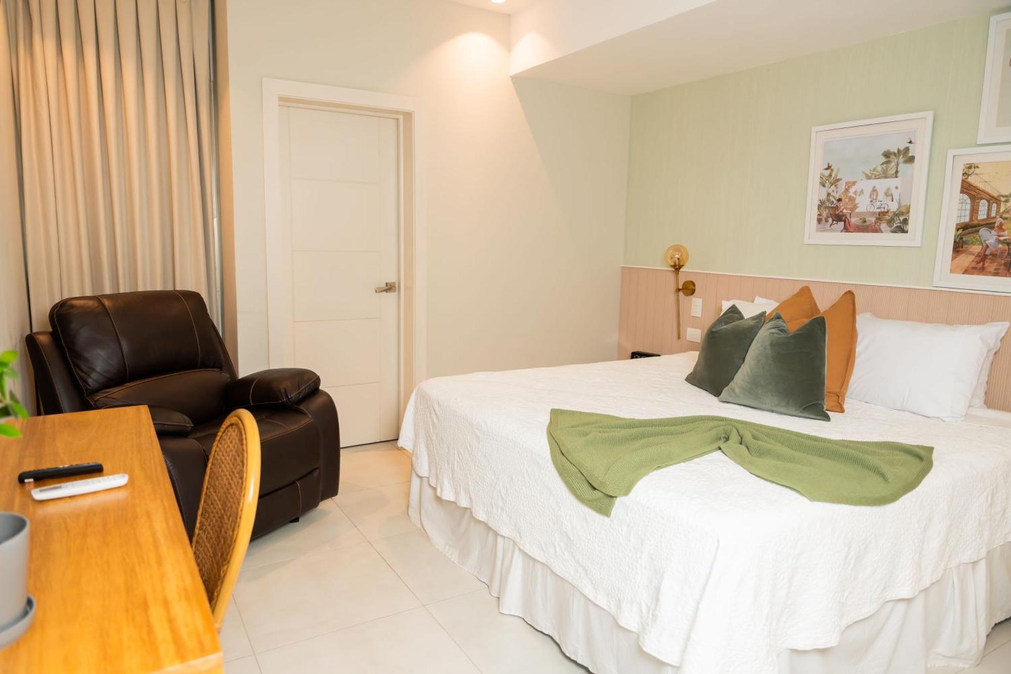 Hotel Stay Here Suites Santo Domingo Bagian luar foto