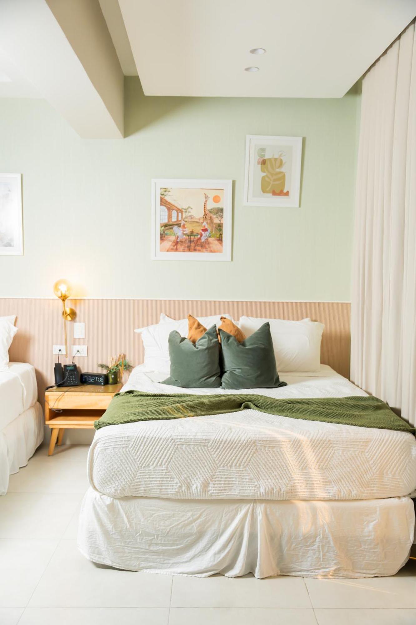 Hotel Stay Here Suites Santo Domingo Bagian luar foto