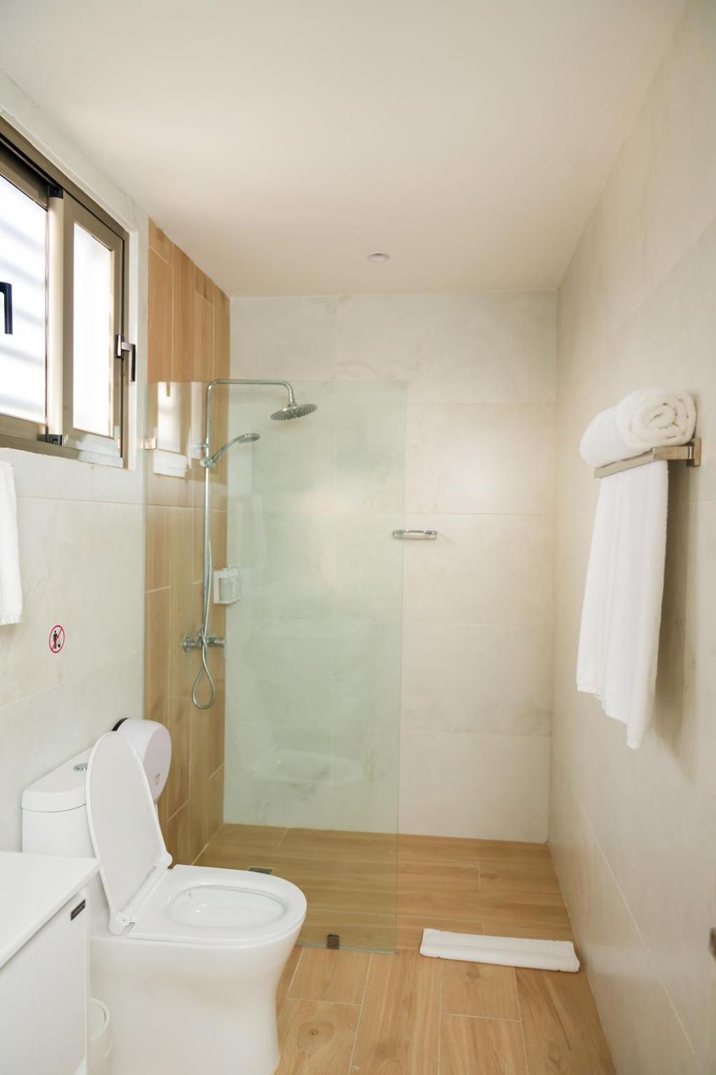 Hotel Stay Here Suites Santo Domingo Bagian luar foto