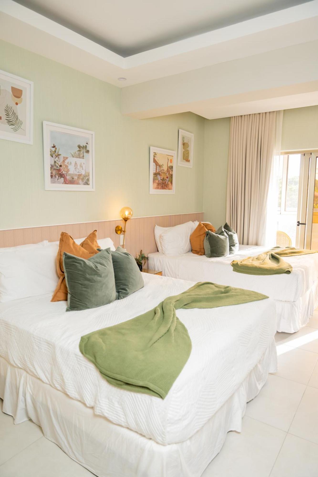 Hotel Stay Here Suites Santo Domingo Bagian luar foto