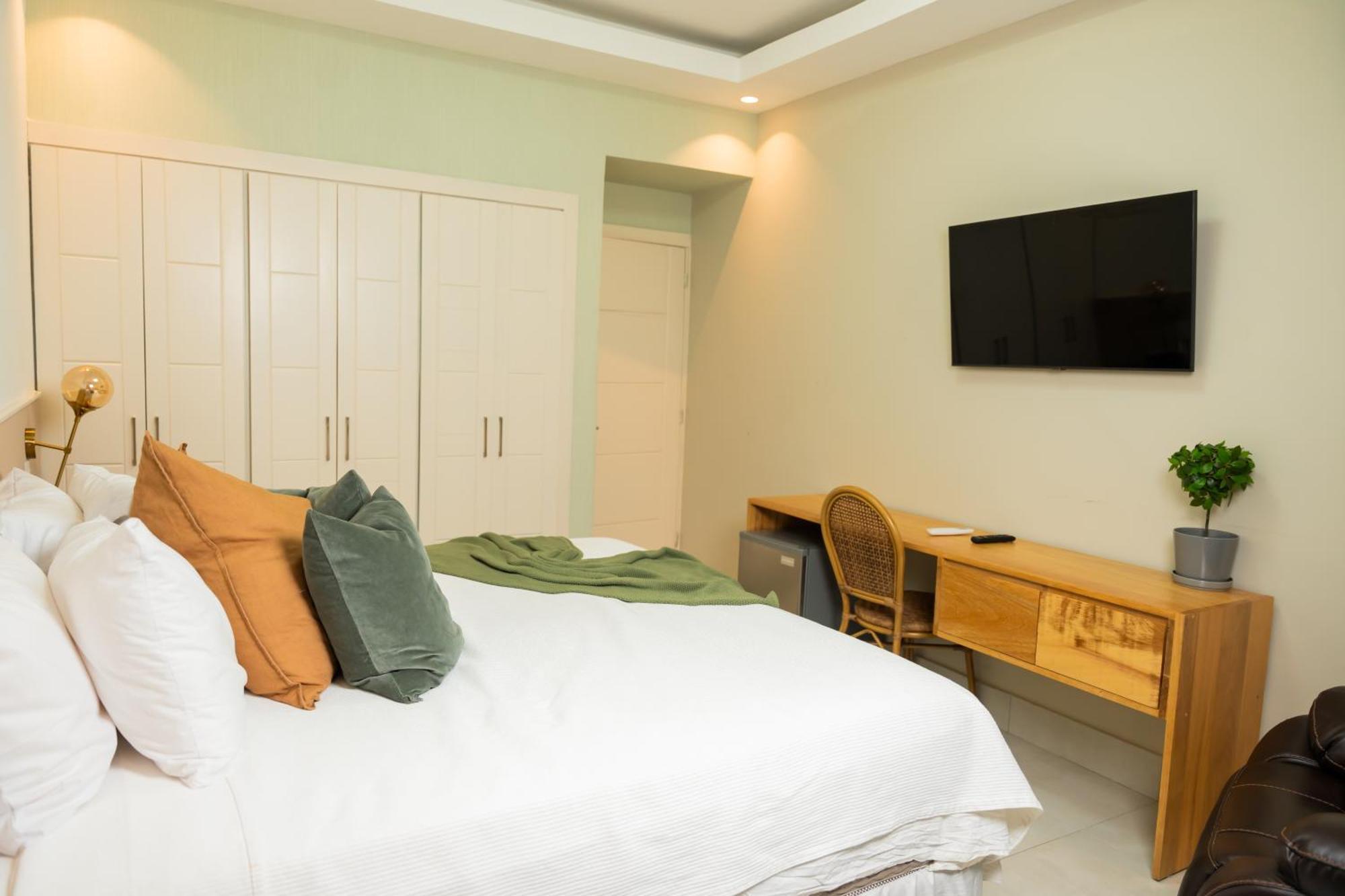 Hotel Stay Here Suites Santo Domingo Bagian luar foto