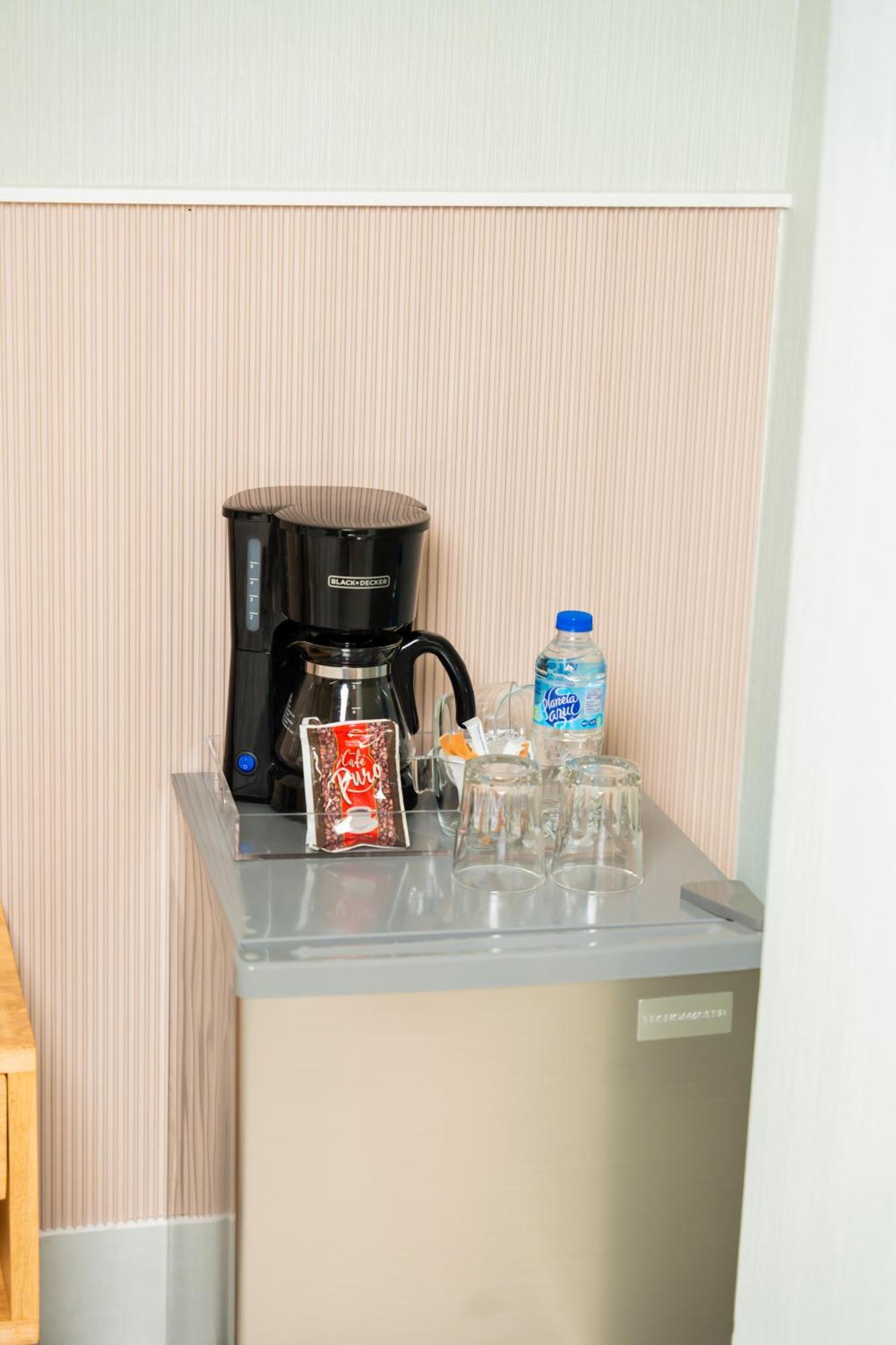 Hotel Stay Here Suites Santo Domingo Bagian luar foto