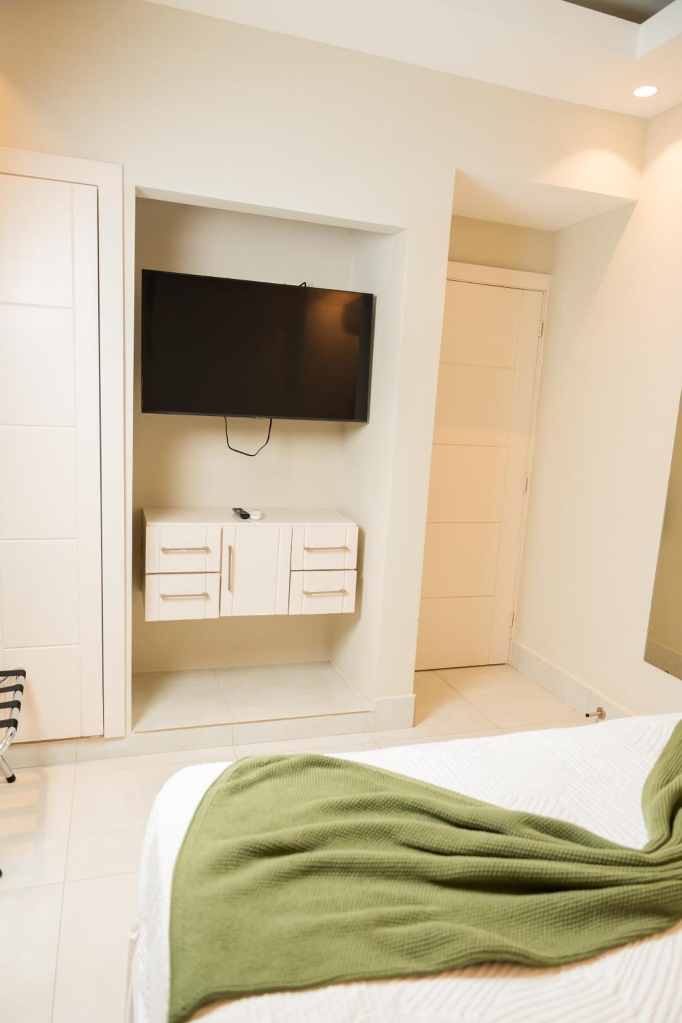 Hotel Stay Here Suites Santo Domingo Ruang foto