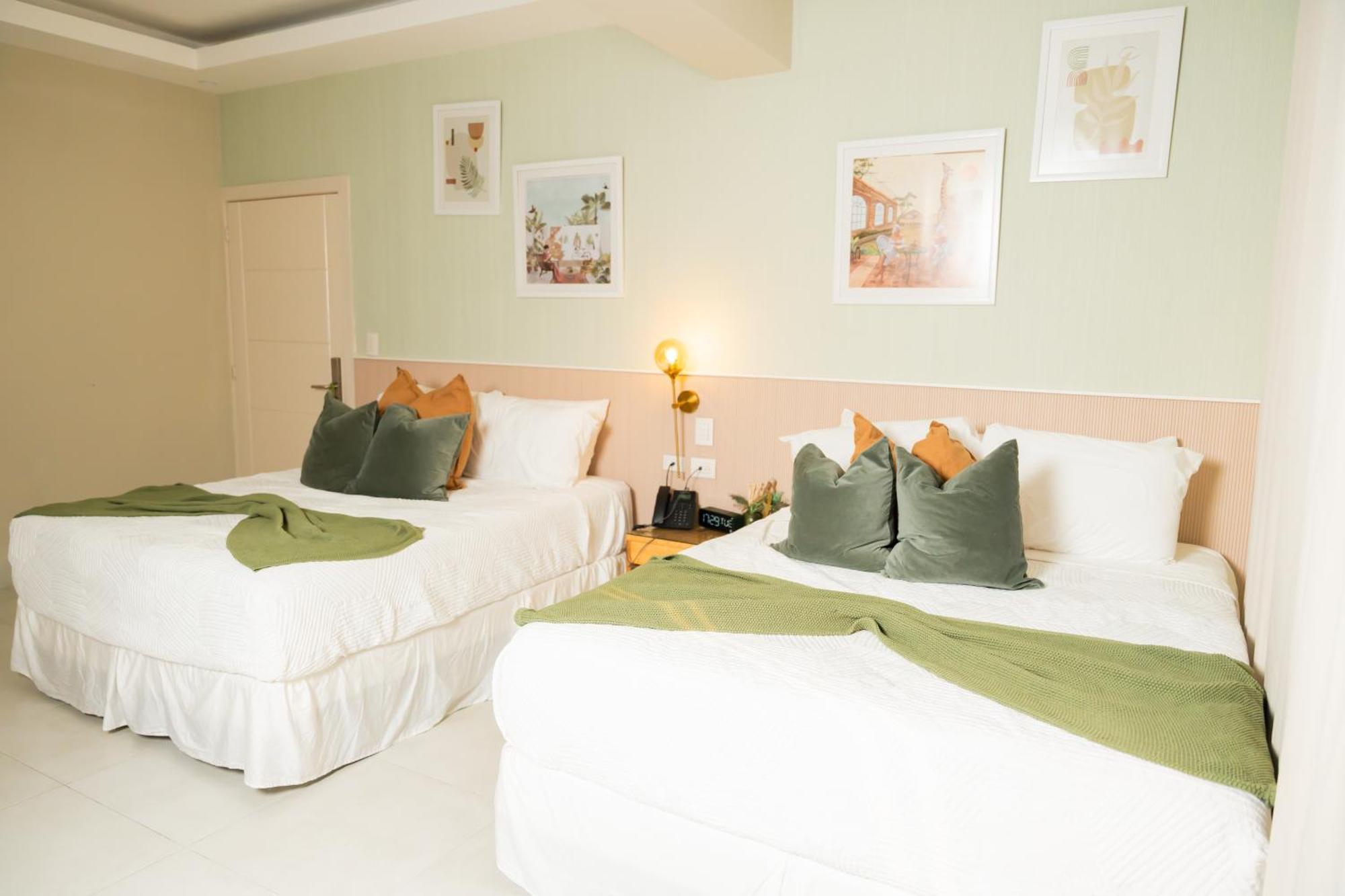 Hotel Stay Here Suites Santo Domingo Bagian luar foto