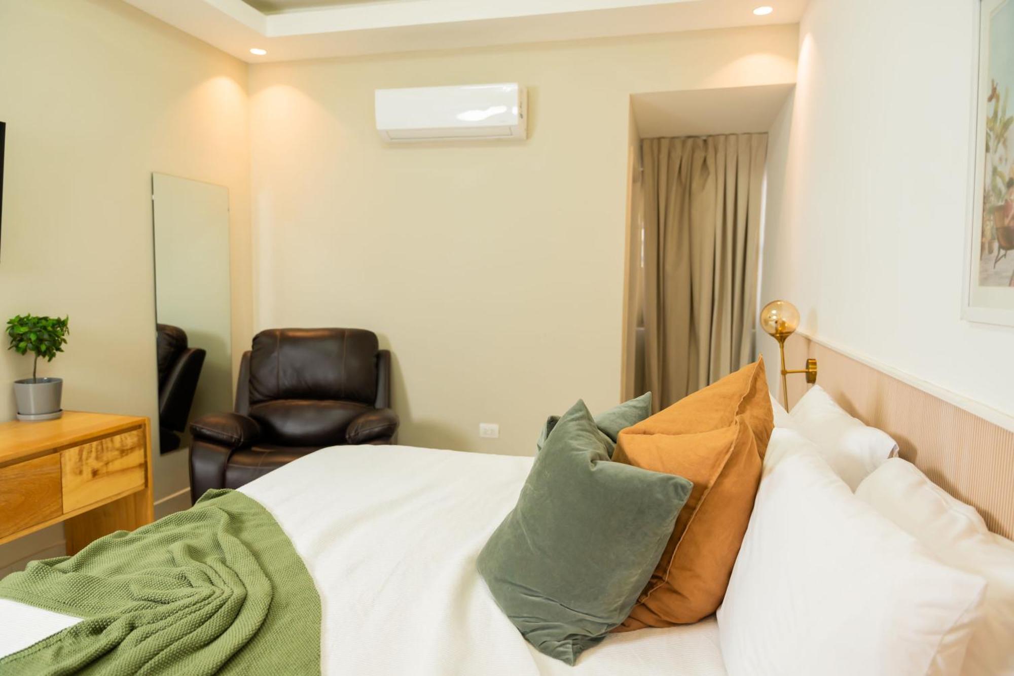 Hotel Stay Here Suites Santo Domingo Bagian luar foto