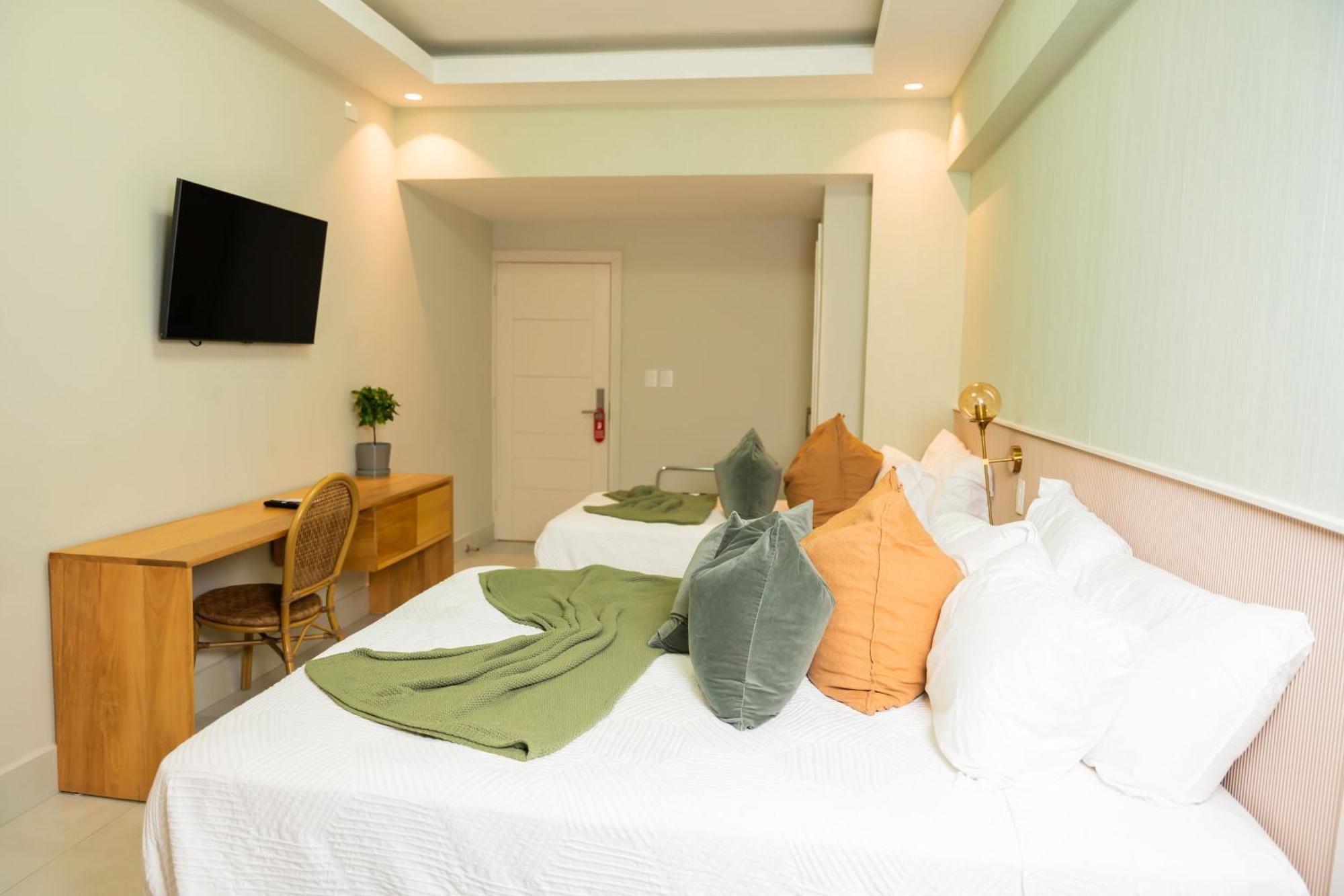 Hotel Stay Here Suites Santo Domingo Bagian luar foto