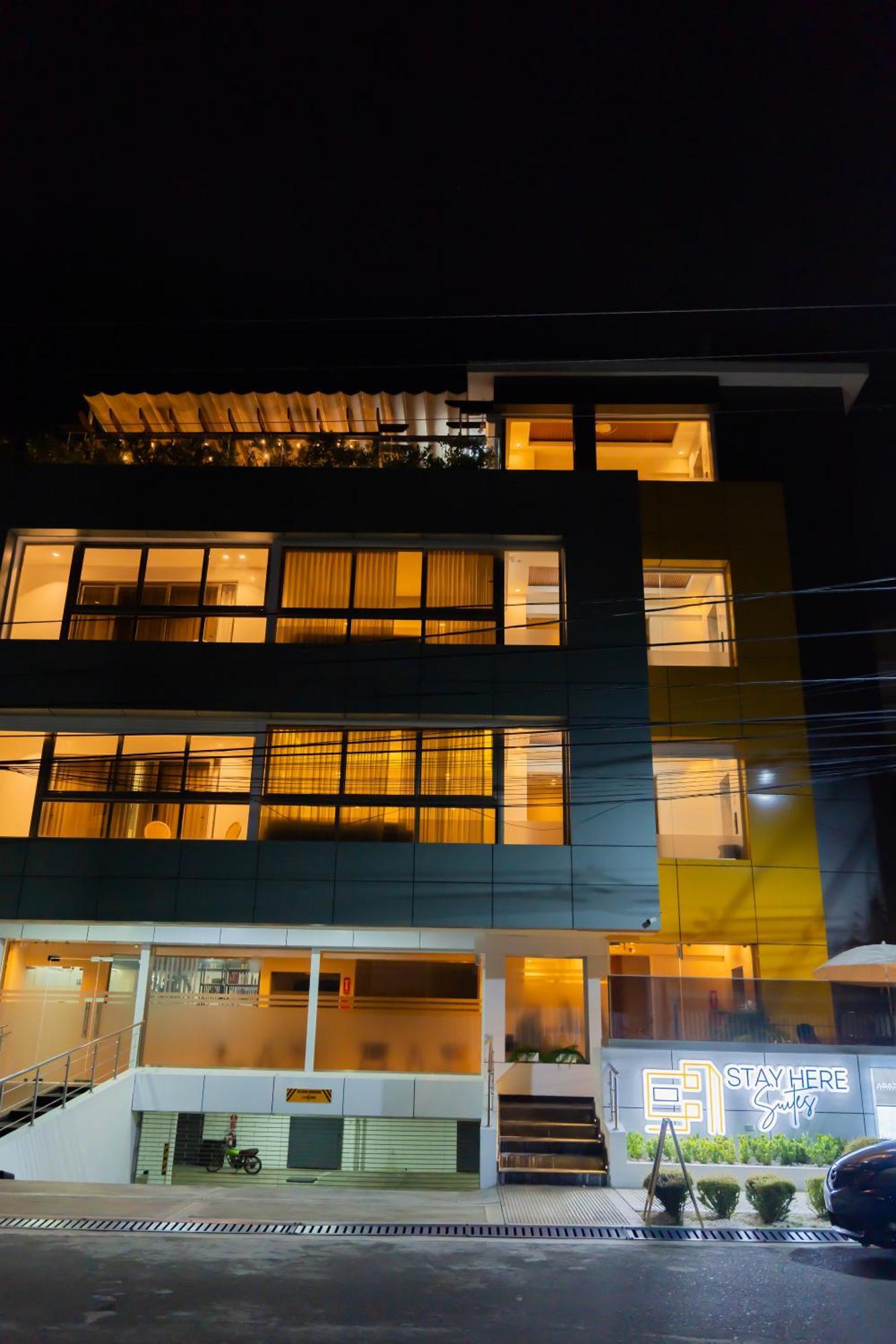 Hotel Stay Here Suites Santo Domingo Bagian luar foto