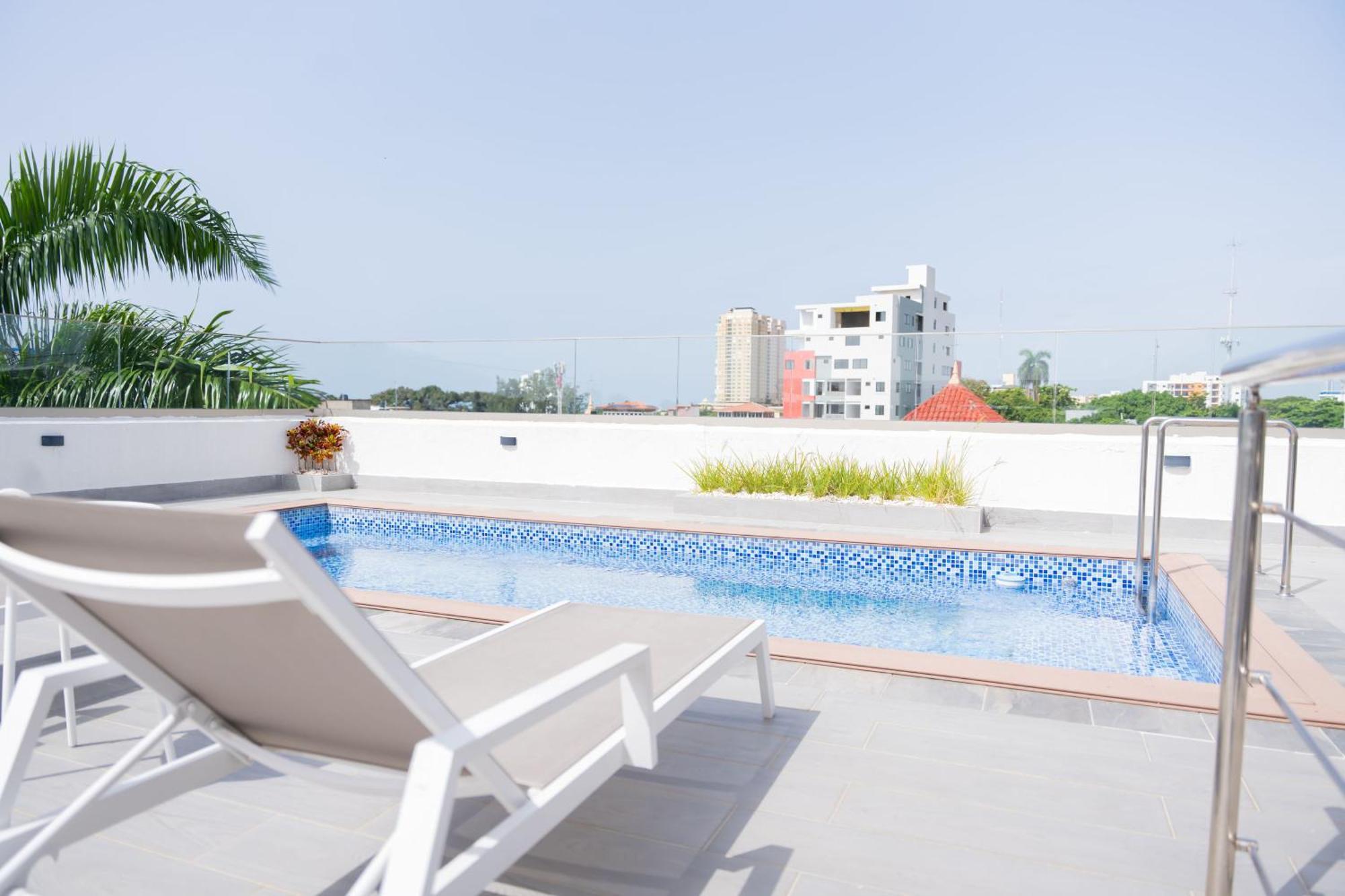 Hotel Stay Here Suites Santo Domingo Bagian luar foto
