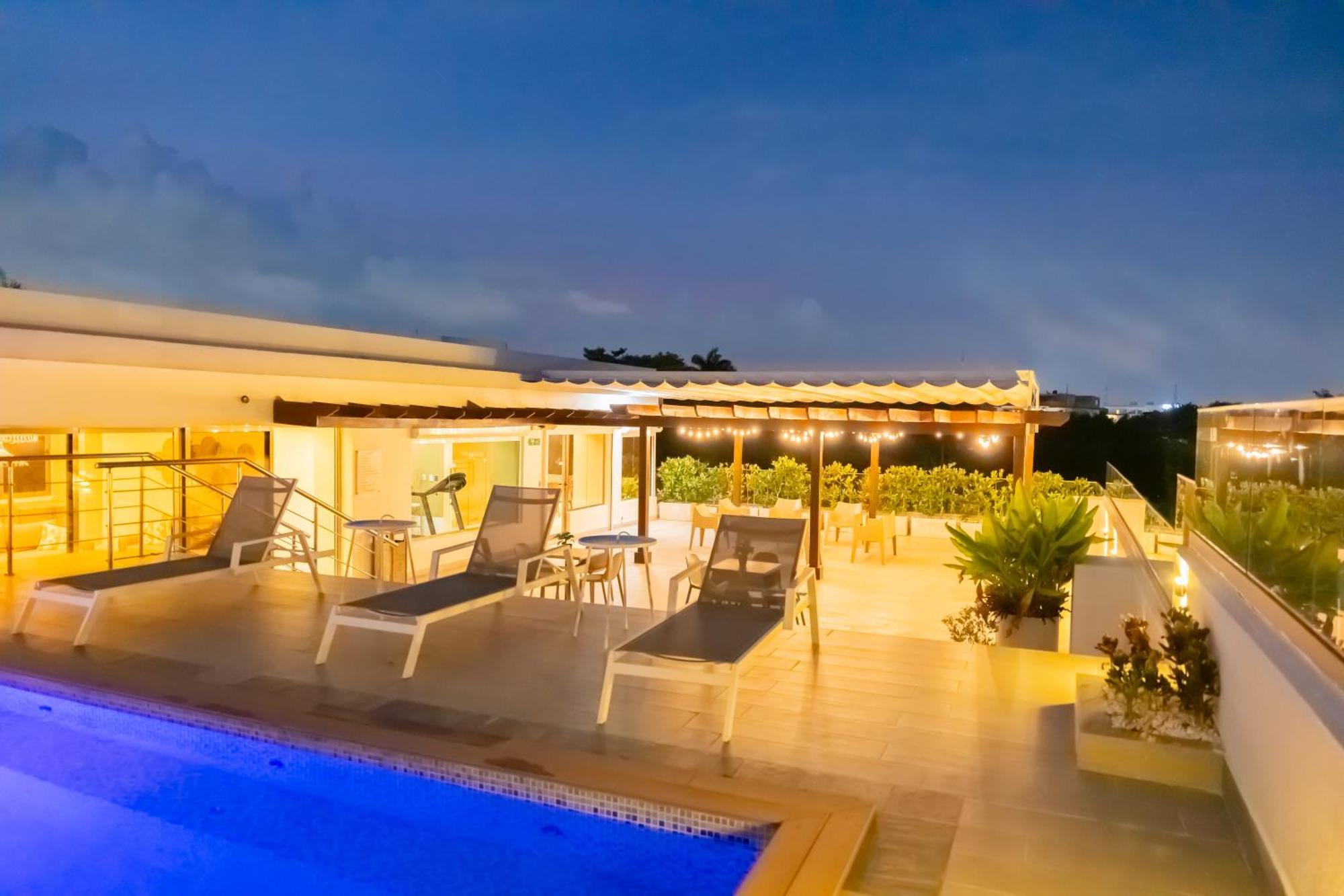 Hotel Stay Here Suites Santo Domingo Bagian luar foto